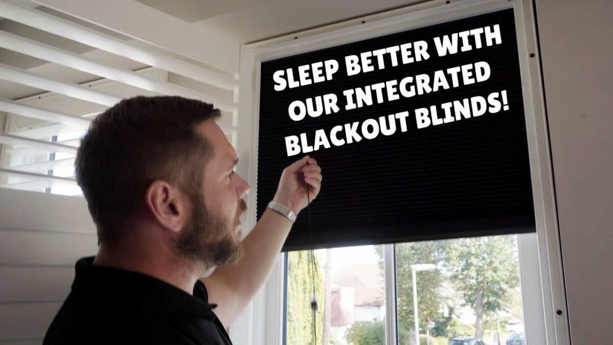 Integrated blackout blinds for room darkening