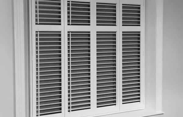 shutters with integrated blackout blinds