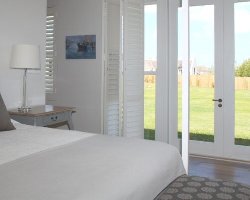 security shutters professionally installed in a bedroom