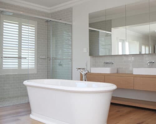 security window shutters professionally installed in a bathroom