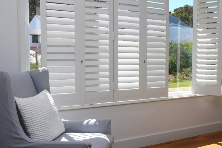 security window shutters professionally installed in a bedroom