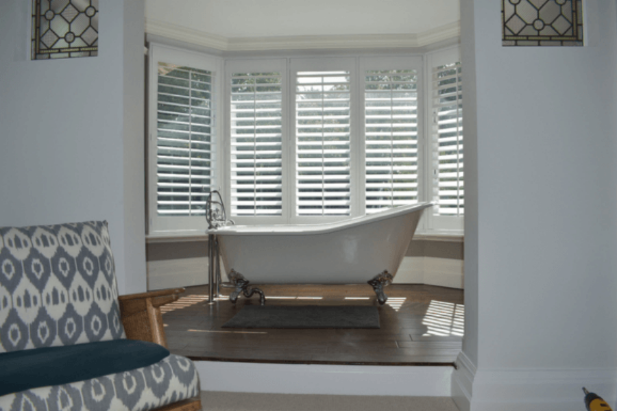 Bathroom plantation shutters installed by a window shutter company